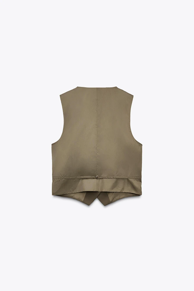 GILET DOS EN MATIÈRES VARIÉES