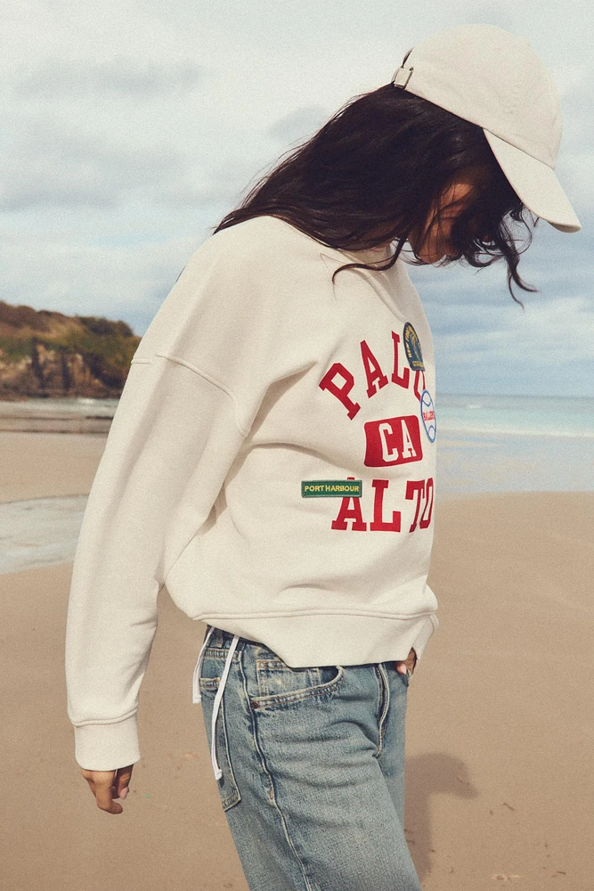 SWEATSHIRT WITH PATCHES
