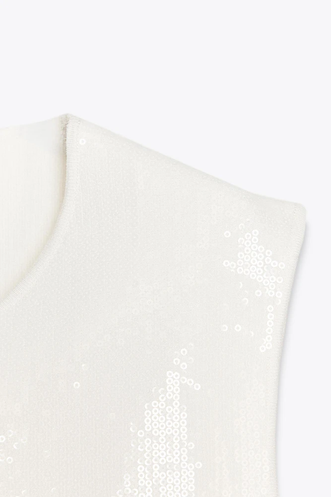 TOP EN MAILLE À SEQUINS PÉPLUM
