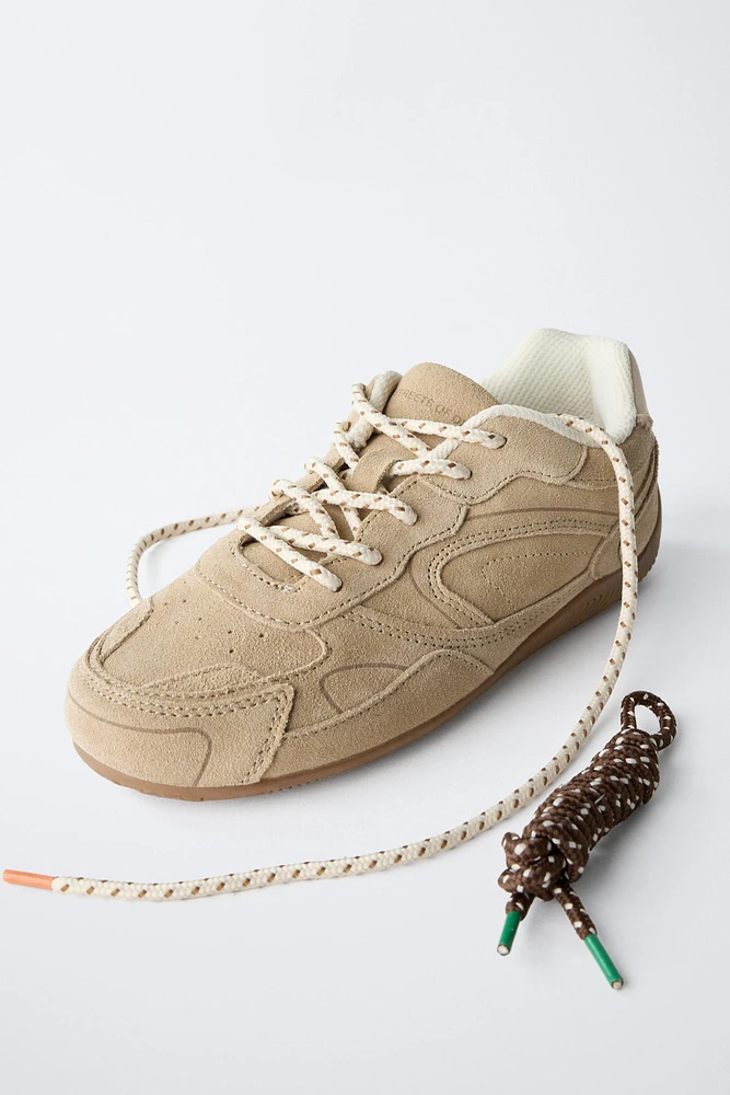 TENNIS EN CUIR À LACETS