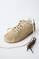 TENNIS EN CUIR À LACETS