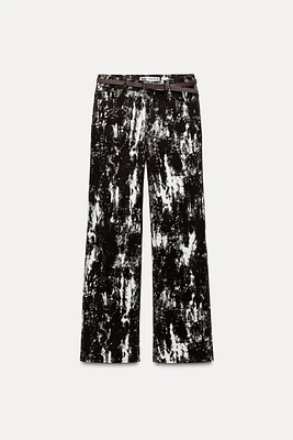 Z1975 HIGH RISE FLOCKED ANIMAL PRINT BELTED JEANS