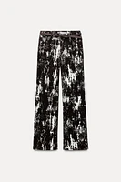 Z1975 HIGH RISE FLOCKED ANIMAL PRINT BELTED JEANS