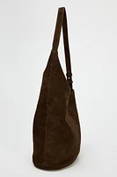 ASYMMETRIC SOFT SUEDE BUCKET BAG