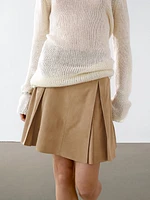 Pleated suede leather skirt