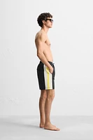 STRIPED LONG SWIM TRUNKS