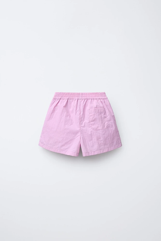 TECHNICAL PLEATED SKORT