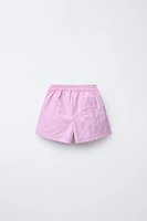 TECHNICAL PLEATED SKORT