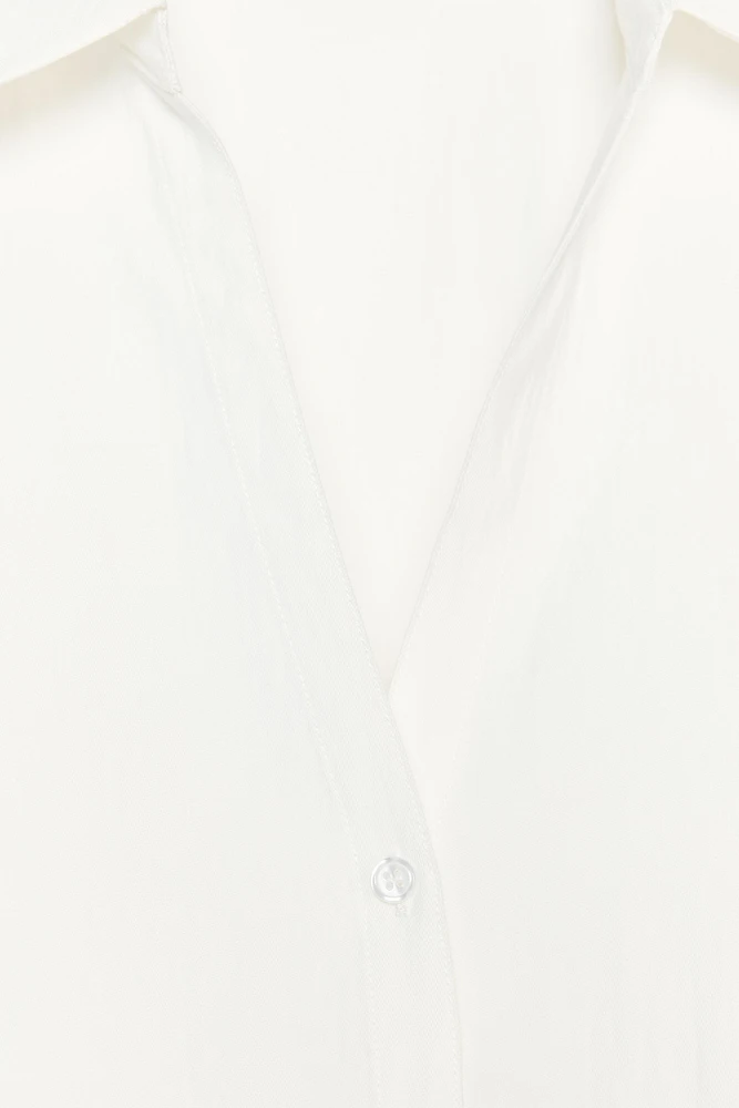 CHEMISE MANCHES COURTES LARGES
