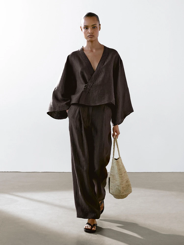 Flowing linen blend trousers with darts