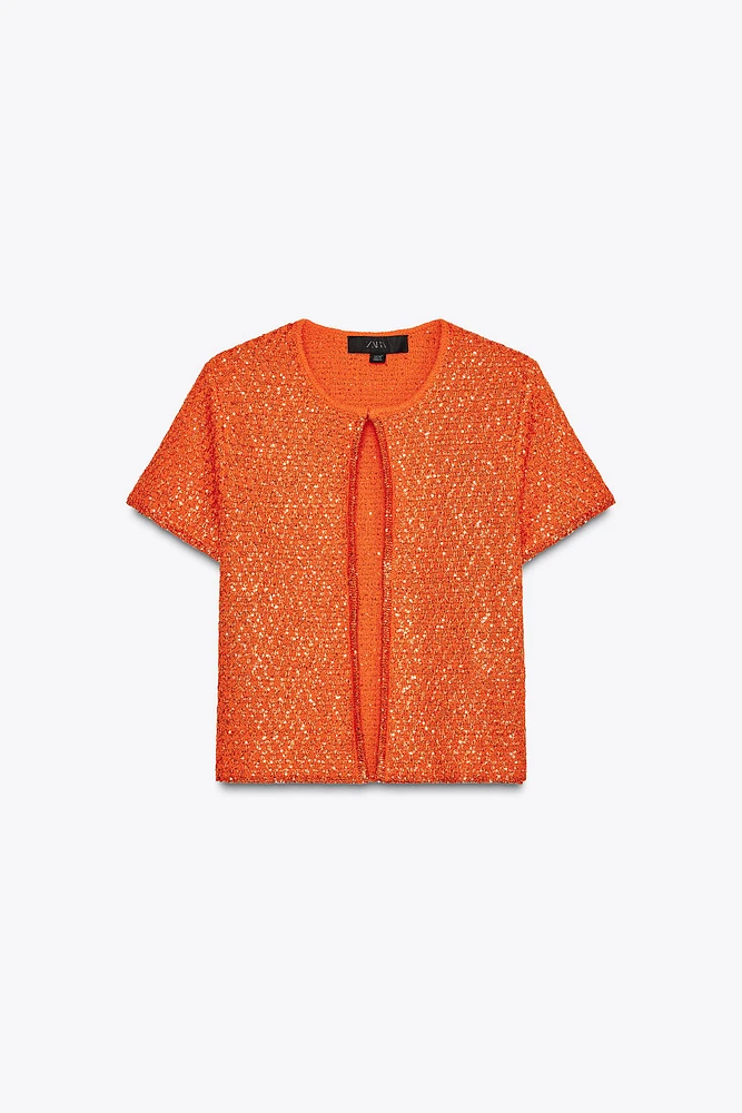 TOP EN MAILLE À SEQUINS