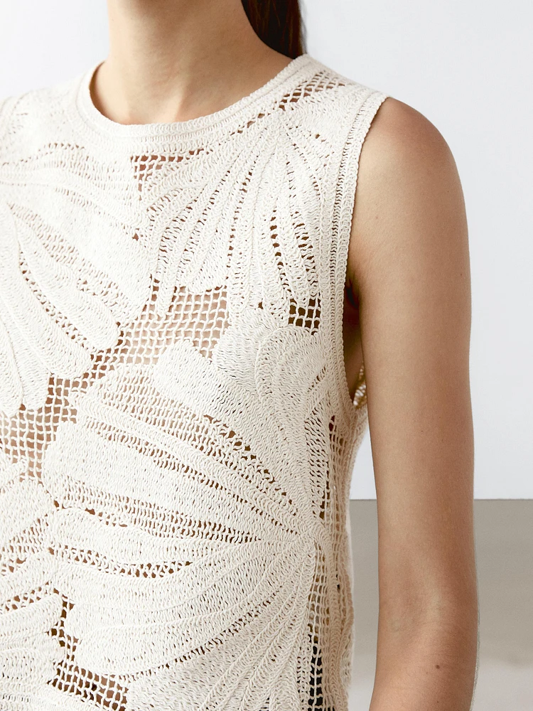Openwork crochet top with floral detail