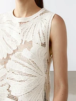 Openwork crochet top with floral detail