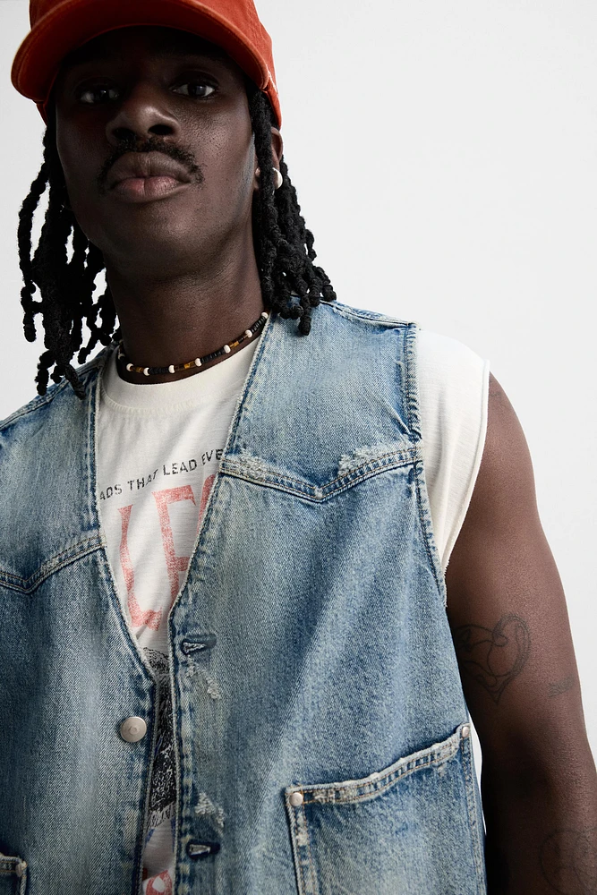 GILET EN DENIM DÉLAVÉ