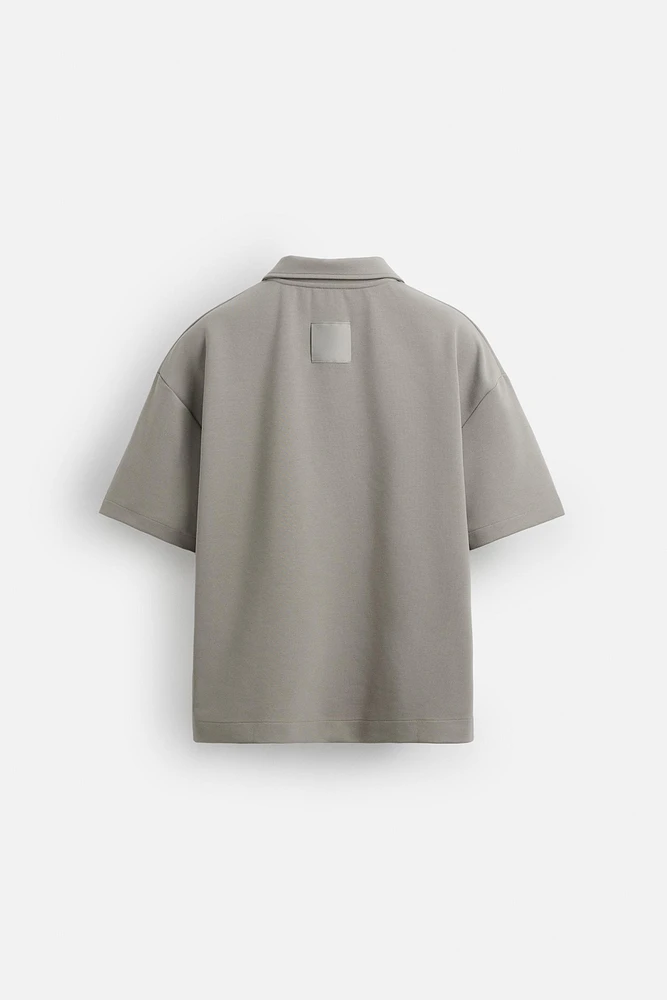 TECHNICAL ZIP POLO SHIRT