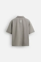 TECHNICAL ZIP POLO SHIRT