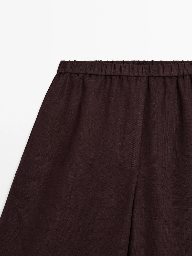 Straight-fit linen trousers with an elasticated waistband
