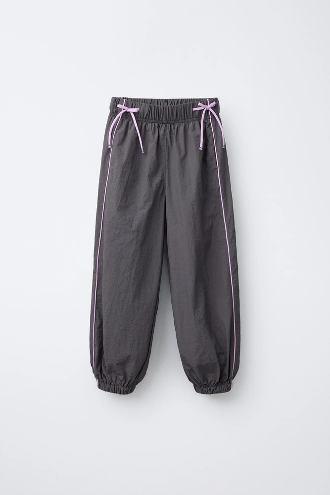 TECHNICAL BOW JOGGER PANTS