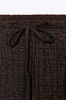 TEXTURED LONG SKIRT