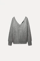 100% WOOL DOUBLE V-NECK SWEATER