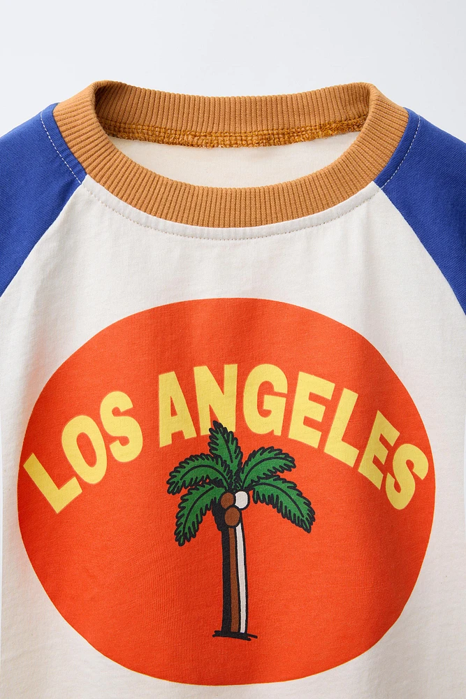 T-SHIRT À MANCHES RAGLAN ET PALMIER