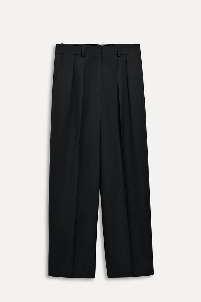 PANTALON À PINCES CONTENANT DE LA LAINE 50E ANNIVERSAIRE