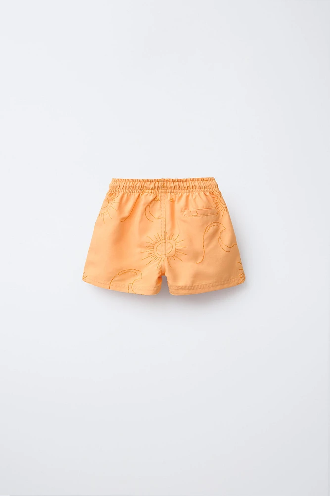 6-14 ANS/ SHORT DE BAIN SOLEILS BRODÉS