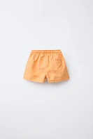 6-14 ANS/ SHORT DE BAIN SOLEILS BRODÉS