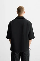 RELAXED FIT TEXTURED POLO SHIRT