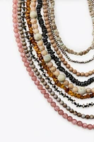 MUKTI-STRAND BEAD NECKLACE