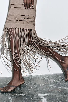 ASYMMETRIC HEELED SANDALS