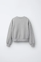 WASHED EFFECT TEXT SWEATSHIRT