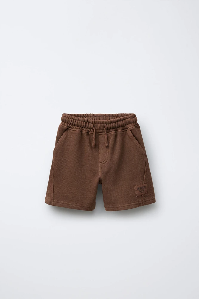 PLUSH LABEL SHORTS
