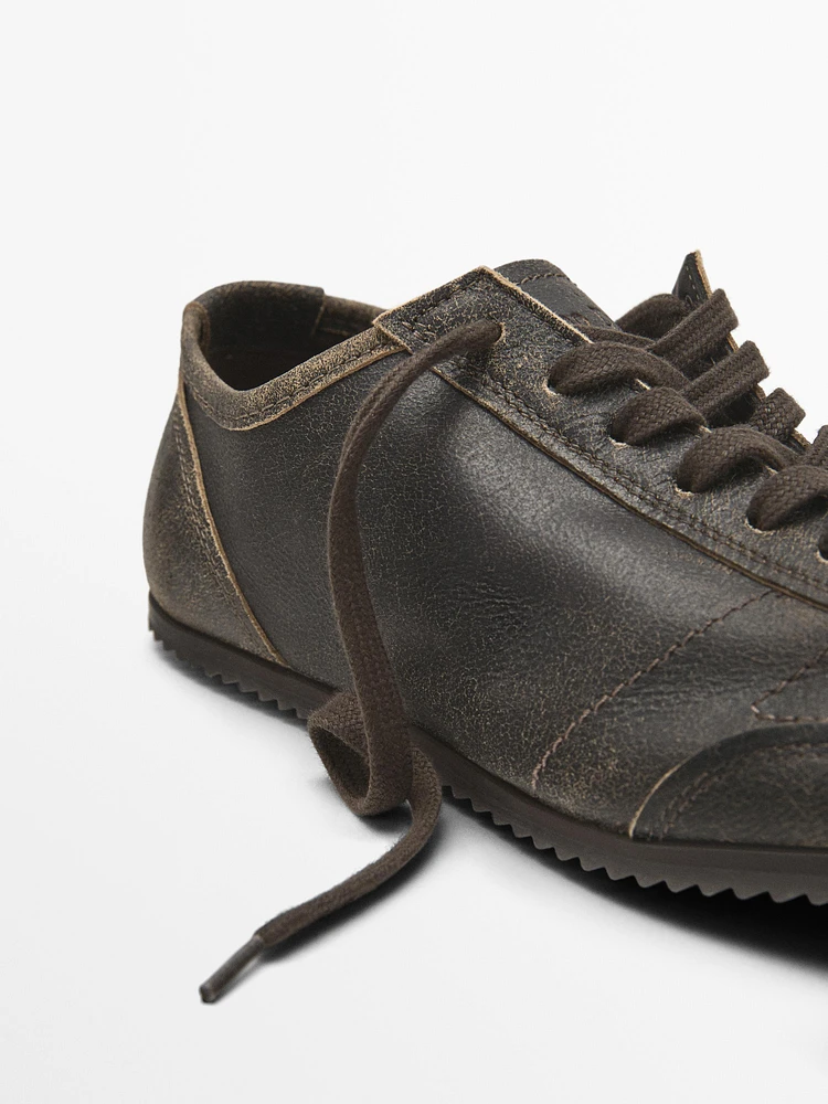 Brown leather trainers