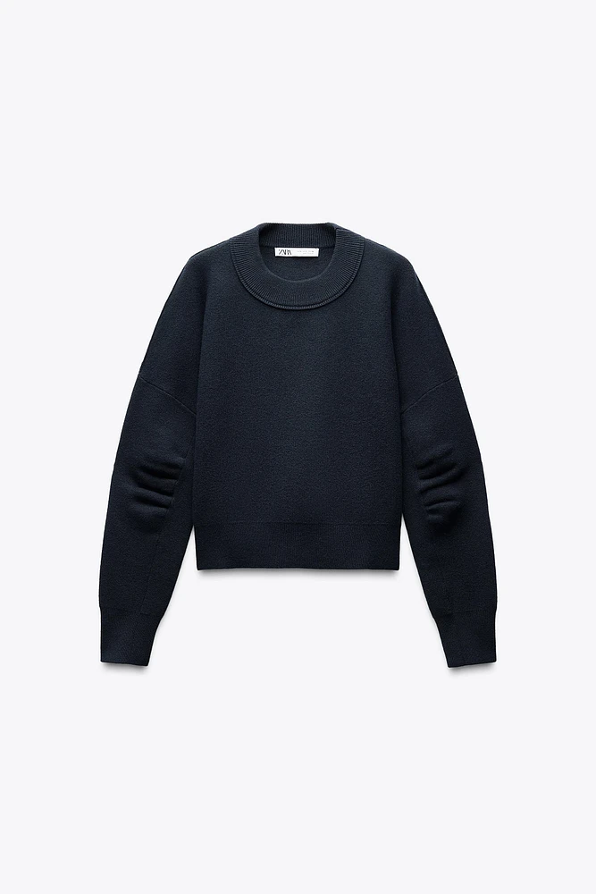 SWEAT EN MAILLE À MANCHES AVEC PLIS