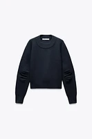 SWEAT EN MAILLE À MANCHES AVEC PLIS
