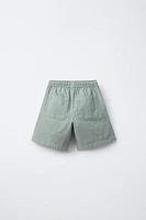 LABEL ELASTIC SHORTS