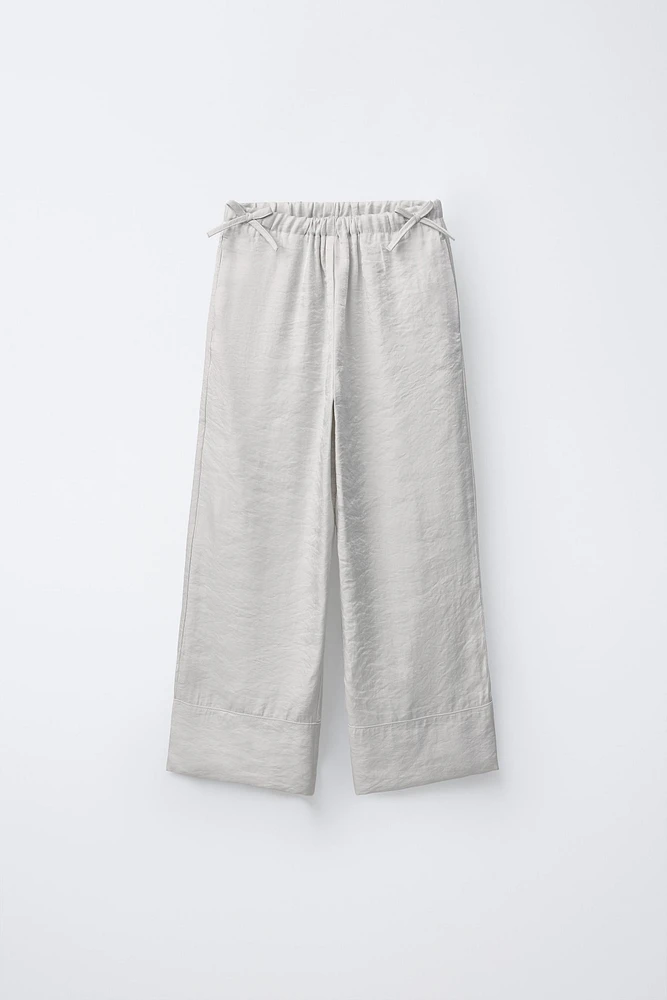 PANTALON JUPE-CULOTTE BRILLANT LACETS