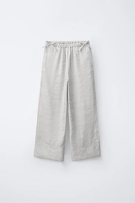 PANTALON JUPE-CULOTTE BRILLANT LACETS
