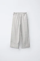 PANTALON JUPE-CULOTTE BRILLANT LACETS