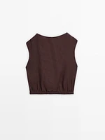 Linen blouse with elasticated hem