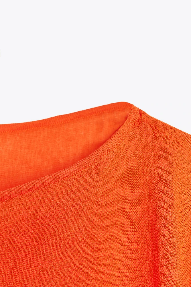 TOP CAPE EN MAILLE UNIE