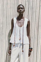 TOP EN MAILLE PÉPLUM