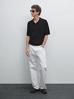 Polo manches courtes en maille texturée