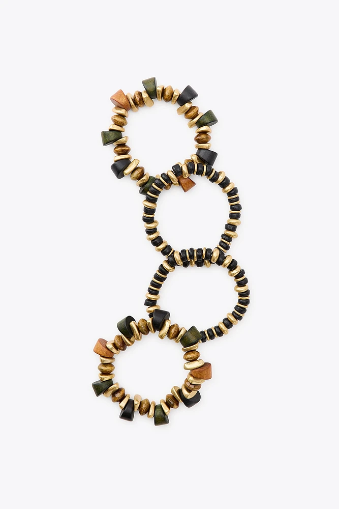 PACK OF 4 WOODEN PIECE BRACELETS