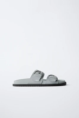 PATENT LEATHER BUCKLE SANDALS