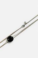 COLLIER PENDENTIF EN MATIÈRES VARIÉES