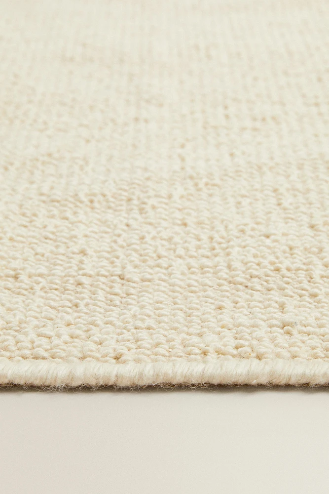 WAVY DETAIL WOOL AREA RUG