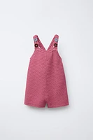 SALOPETTE COURTE EN MAILLE CROCHET FLEURS
