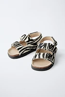 SANDALES EN CUIR ANIMAL PRINT
